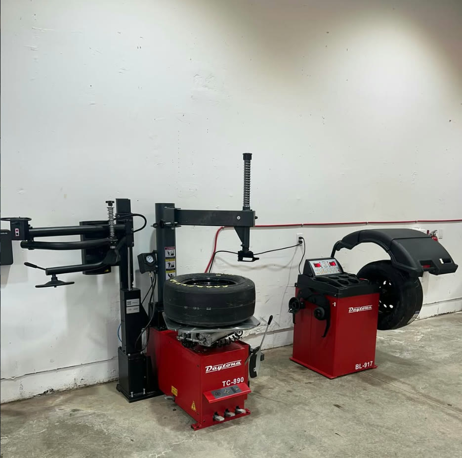 Daytona tire changer and wheel balancer in the shop